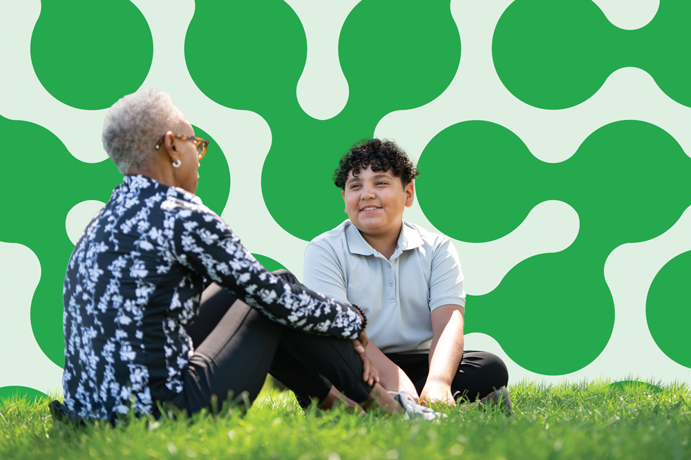 Participant speaking with a mentor.